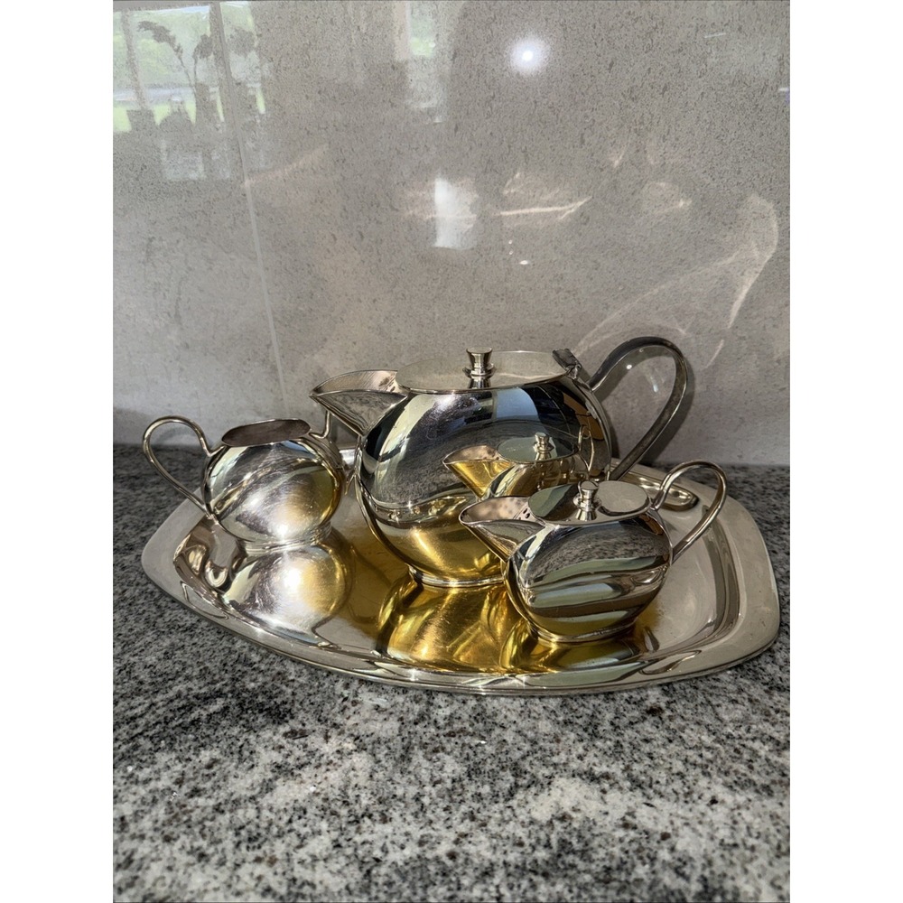 Silver Plated Teapot Creamer Sugar Cup And Silver Serving Tray